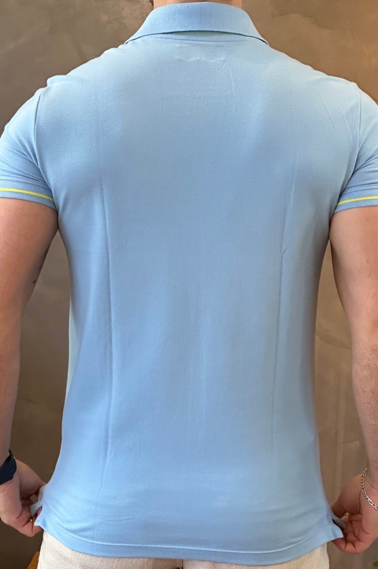 Polo Azul Claro Acostamento
